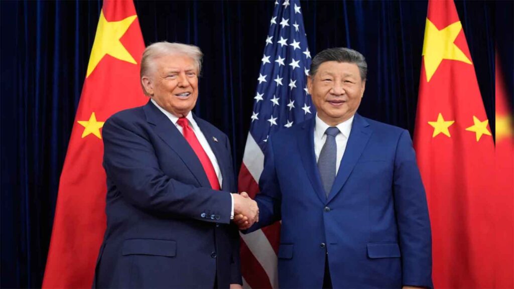 Donald Trump and Xi Jinping shake hands during the APEC Summit after reaching a trade agreement between the United States and China.